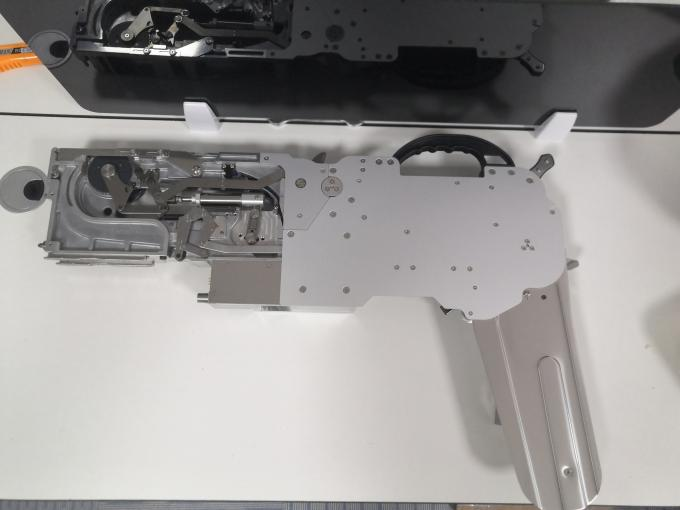 latest company news about Working principle and introduction of Samsung SMT machine feeder in SMT workshop 2